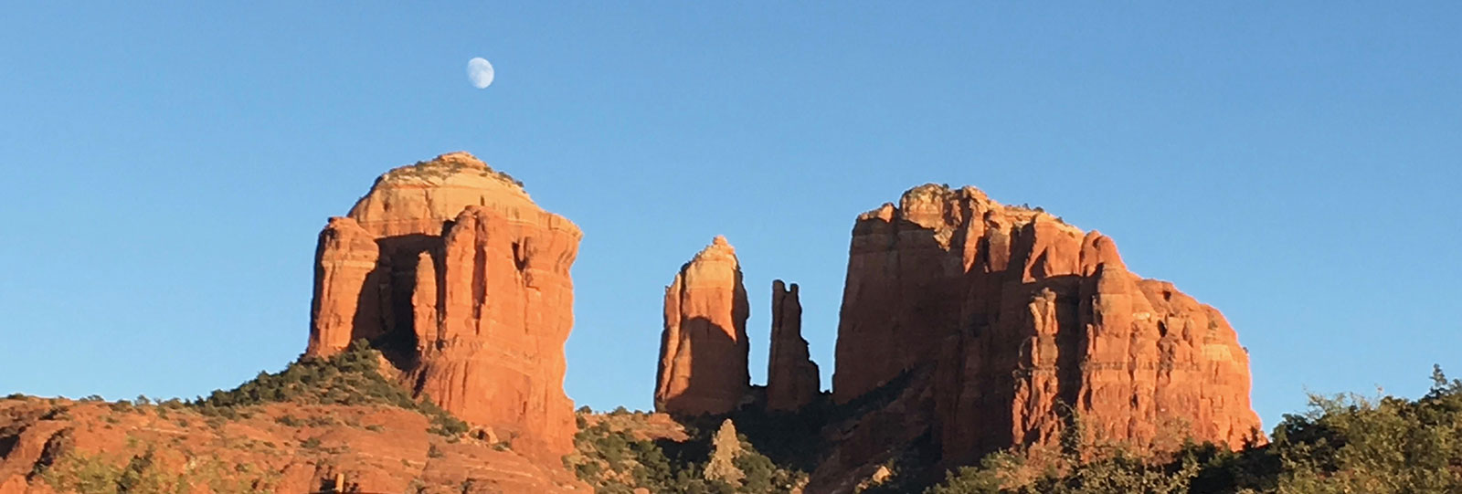 two peaks with the moon in between